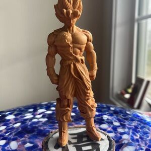 Hand carved Goku Wooden Action Figure, 5.5 inches tall.